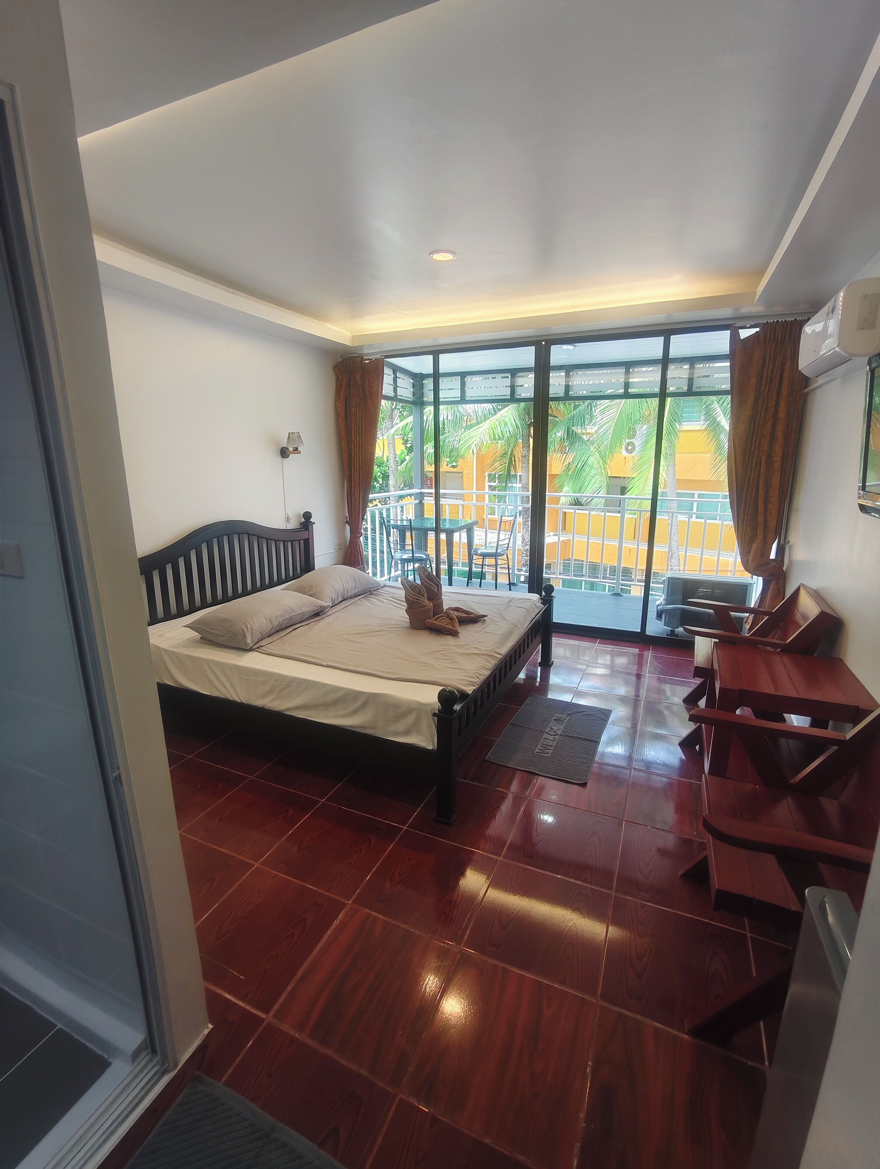Classic Double Room, Balcony, Partial Ocean View | In-room safe, blackout curtains, free WiFi, bed sheets