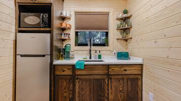 Fridge, microwave, toaster, cookware/dishes/utensils