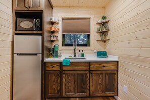 Fridge, microwave, toaster, cookware/dishes/utensils
