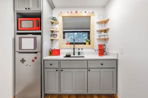 Fridge, microwave, toaster, cookware/dishes/utensils