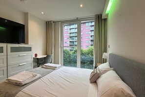 1 bedroom, desk, iron/ironing board, travel cot