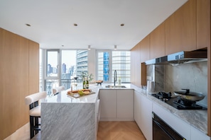Departamento Elite | Cocina privada | Artículos de limpieza y toallas de papel 