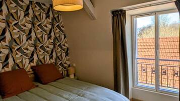 1 slaapkamer, een strijkplank/strijkijzer, gratis wifi, beddengoed