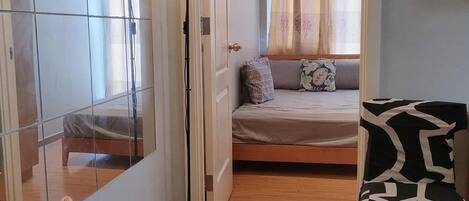 Classic Condo, 2 Bedrooms, Balcony, Pool View | Living room | 50-inch Smart TV with digital channels