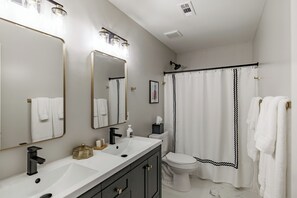 Hair dryer, towels, soap, shampoo