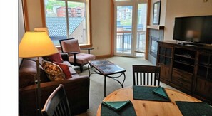 TV, fireplace, books