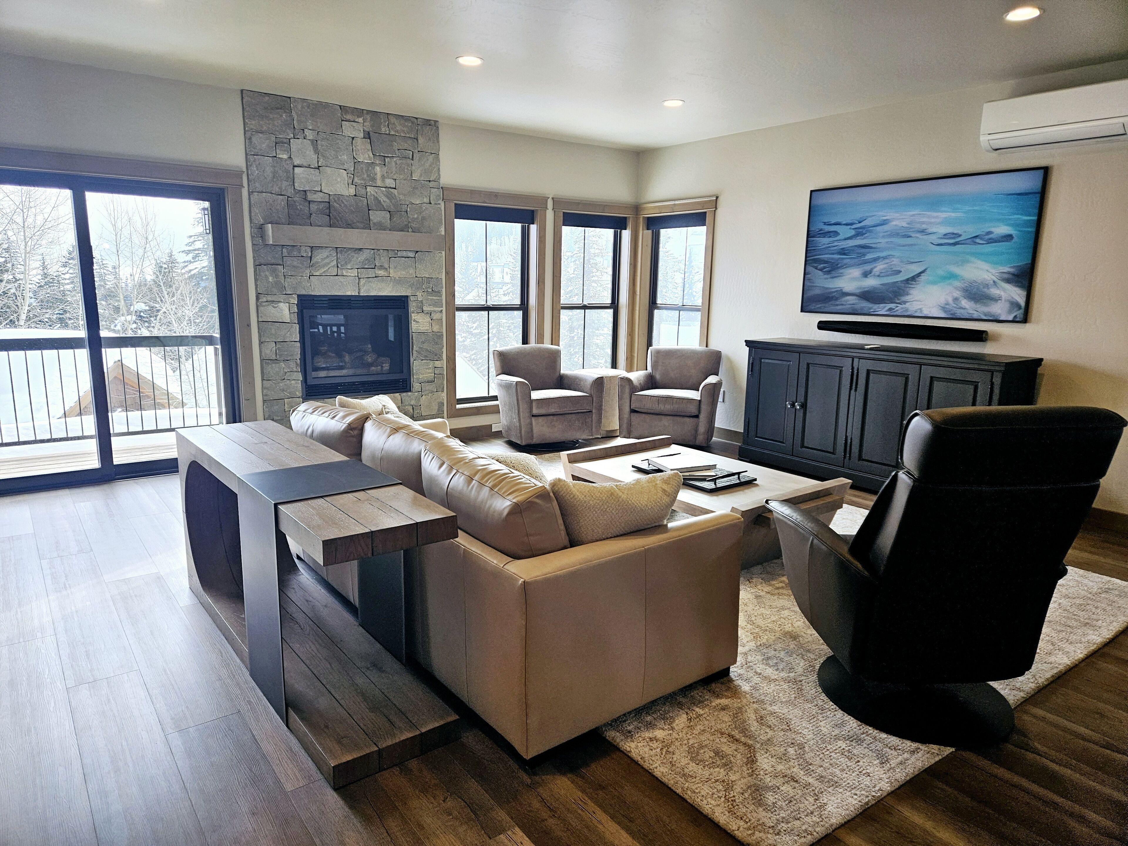 TV, fireplace, books