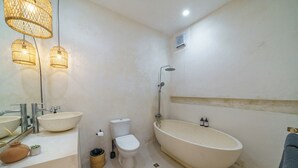 A bathroom with a bathtub, two sinks, a toilet, and a shower. - Exclusive Villa with Breathtaking Views, Bali Villa 2180 (Bali)