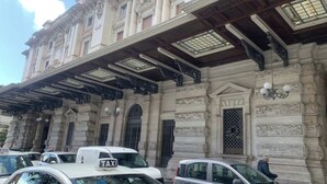 A building with classical architecture, including ornate columns and a detailed facade.
