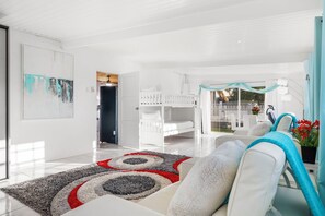 4 bedrooms, desk, iron/ironing board, travel cot