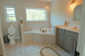 Shower, jetted tub, hair dryer, towels