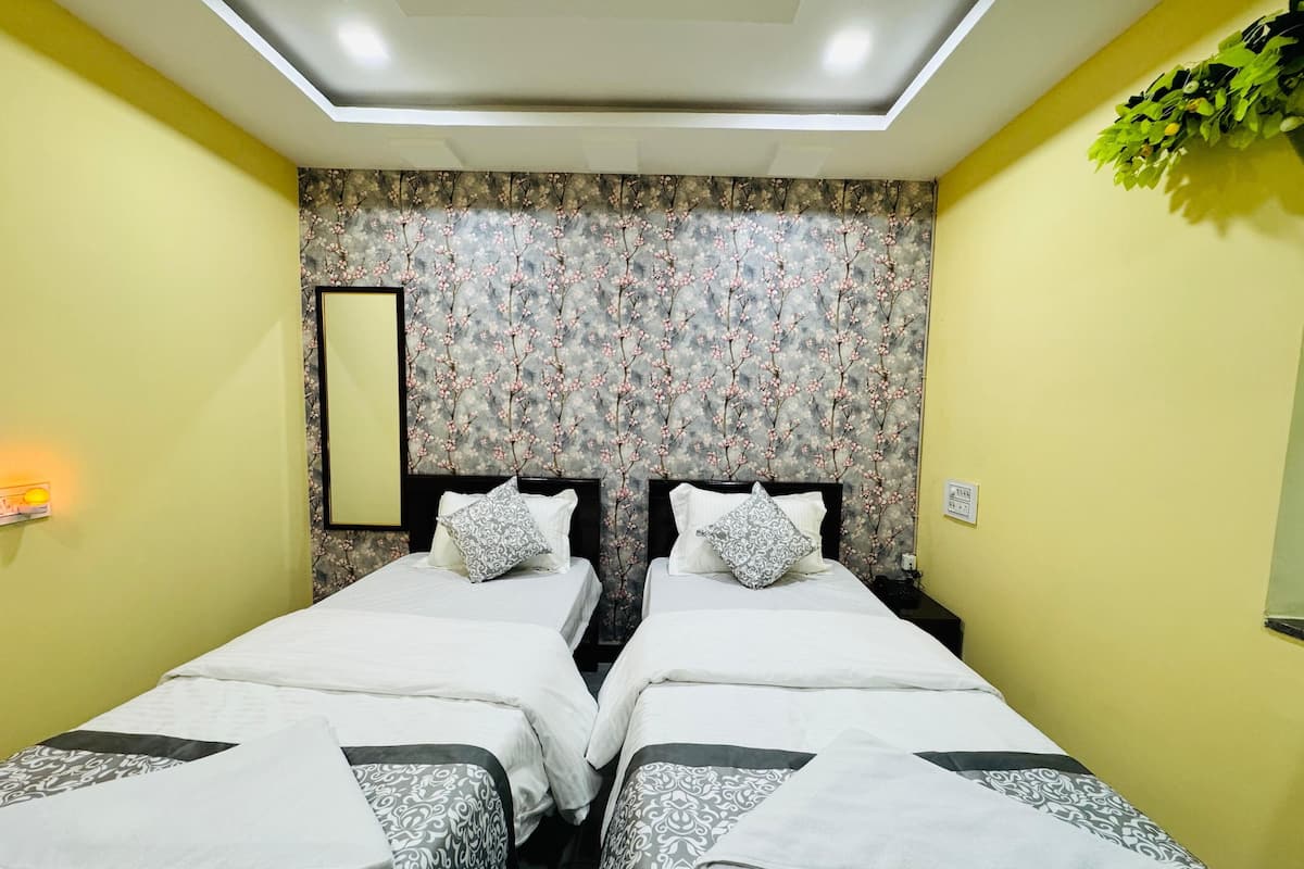 Deluxe Double or Twin Room, Private Bathroom | Desk, laptop workspace, blackout drapes, iron/ironing board