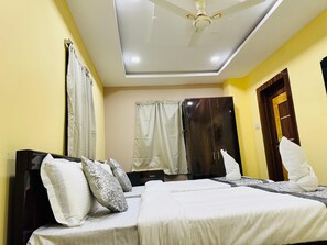 Standard Double or Twin Room, Private Bathroom | Desk, laptop workspace, blackout drapes, iron/ironing board - Hotel Hyderabad Pulse (Hyderabad)