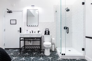 Shower, eco-friendly toiletries, hair dryer, towels