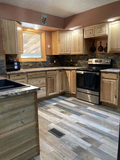 Tri-level, 4 bedroom, spacious, home away from home in a quiet neighborhood.