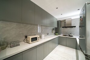 Senior Apartment | Private kitchen | Fridge, cookware/dishes/utensils, paper towels - Book and Bed - SML Center (Shanghai)