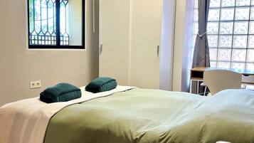 2 dormitorios, tabla de planchar con plancha, wifi y ropa de cama