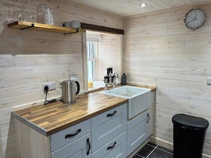 Fridge, stovetop, electric kettle, toaster