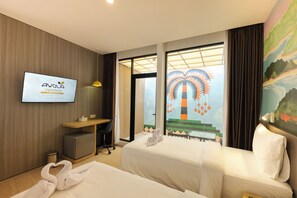 Habitación Deluxe con 2 camas individuales | Escritorio, wifi gratis, ropa de cama