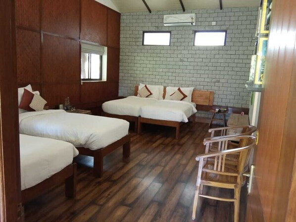 Luxury Triple Room, 3 Bedrooms, Resort View | In-room safe, laptop workspace, blackout drapes, soundproofing