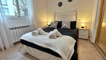 2 habitaciones, tabla de planchar con plancha, wifi y ropa de cama