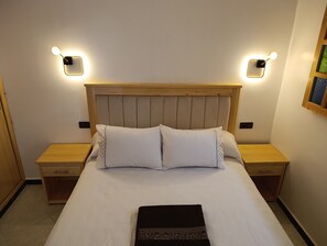 1 habitación, caja de seguridad en la habitación y ropa de cama 
