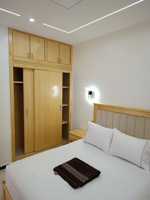 1 habitación, caja de seguridad en la habitación y ropa de cama 