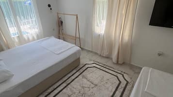 1 chambre, fer et planche à repasser, draps fournis