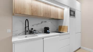 Fridge, microwave, stovetop, coffee/tea maker