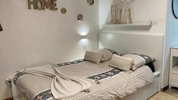 1 chambre, fer et planche Ă repasser, Wi-Fi, draps fournis