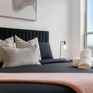 2 bedrooms, desk, iron/ironing board, travel crib