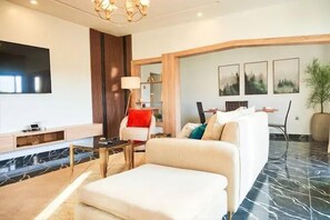 Economy Apartment, Balcony, City View | Living area - Cortona Luxury Suites (Bwari)