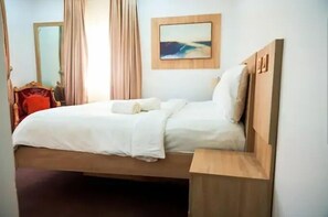 Economy Apartment, Balcony, City View | Desk, laptop workspace, soundproofing, iron/ironing board