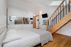 2 chambres, fer et planche à repasser, Wi-Fi, draps fournis