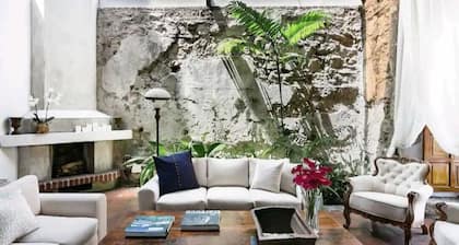 Look up at the stars as you lie on the sofa in this loft apartment