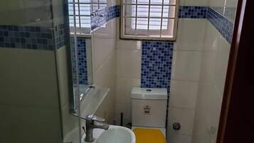 Family Apartment, Balcony, City View | Bathroom | Free toiletries, hair dryer, towels, soap