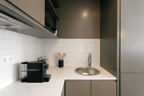 Fridge, microwave, dishwasher, coffee/tea maker