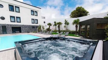Outdoor pool, pool umbrellas, pool loungers
