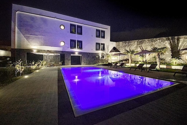Outdoor pool, pool umbrellas, sun loungers
