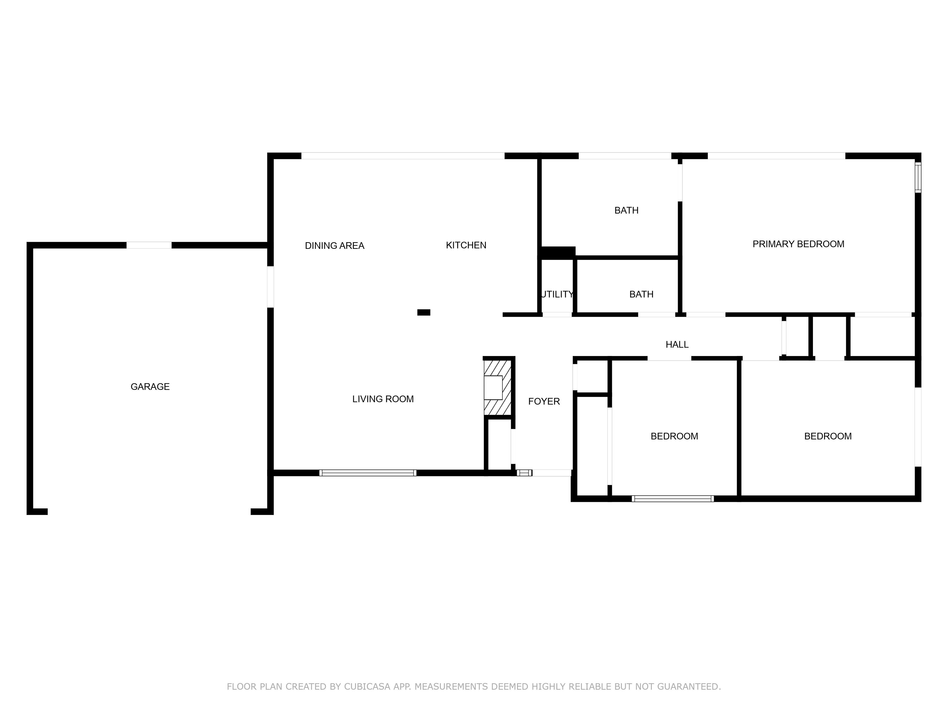 A floor plan with a garage, dining area, kitchen, living room, foyer, utility, primary bedroom, hall, and two bedrooms.