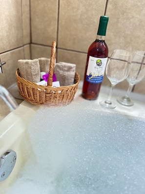 Shower, hydromassage showerhead, towels, soap