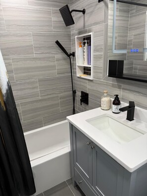 Hair dryer, towels, soap, toilet paper - Welcome to San Sebastian, an exquisite home nestled in Long Beach, New York. (Long Beach)
