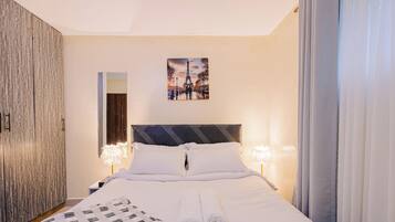 1 chambre, fer et planche Ă repasser, Wi-Fi, draps fournis