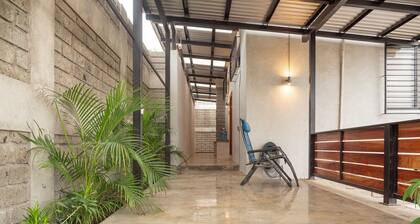 Casita Pelicano is a sleek, surf studio in Playa Remanso with AC & an ocean view