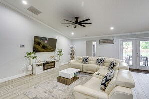 TV, fireplace, table football - Private Pool & Fire Pit: Home in West Palm Beach! (West Palm Beach)