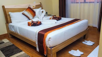 Habitación doble Deluxe, vista a la ciudad | Wifi gratis y ropa de cama
