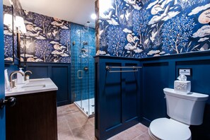 Shower, eco-friendly toiletries, hair dryer, towels