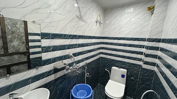 Shower, bidet, towels, soap
