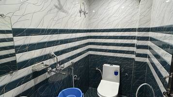 Shower, bidet, towels, soap