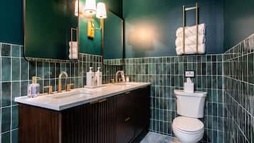 Shower, eco-friendly toiletries, hair dryer, towels